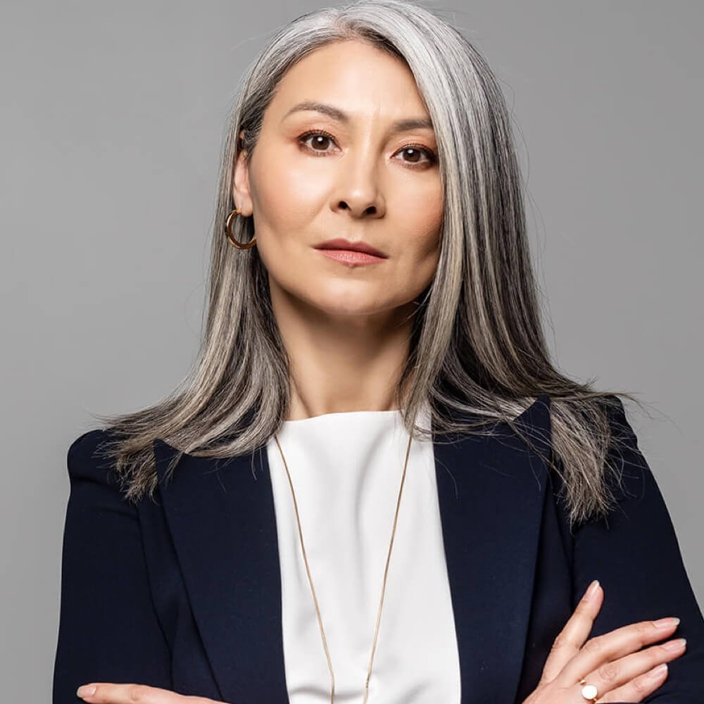 confident-asian-businesswoman-with-grey-hair-and-c-2023-11-27-04-55-11-utc-1.jpg