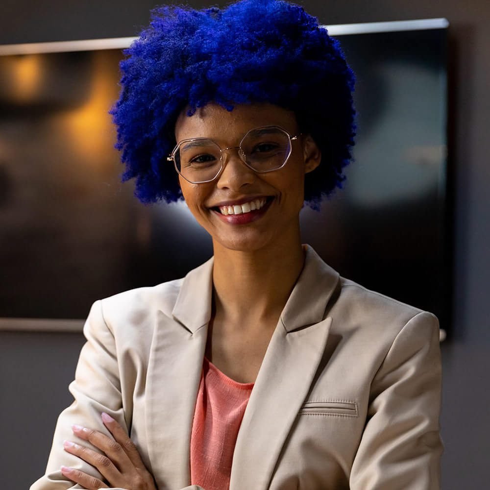 portrait-of-happy-biracial-casual-businesswoman-wi-2023-11-27-05-03-18-utc-1.jpg