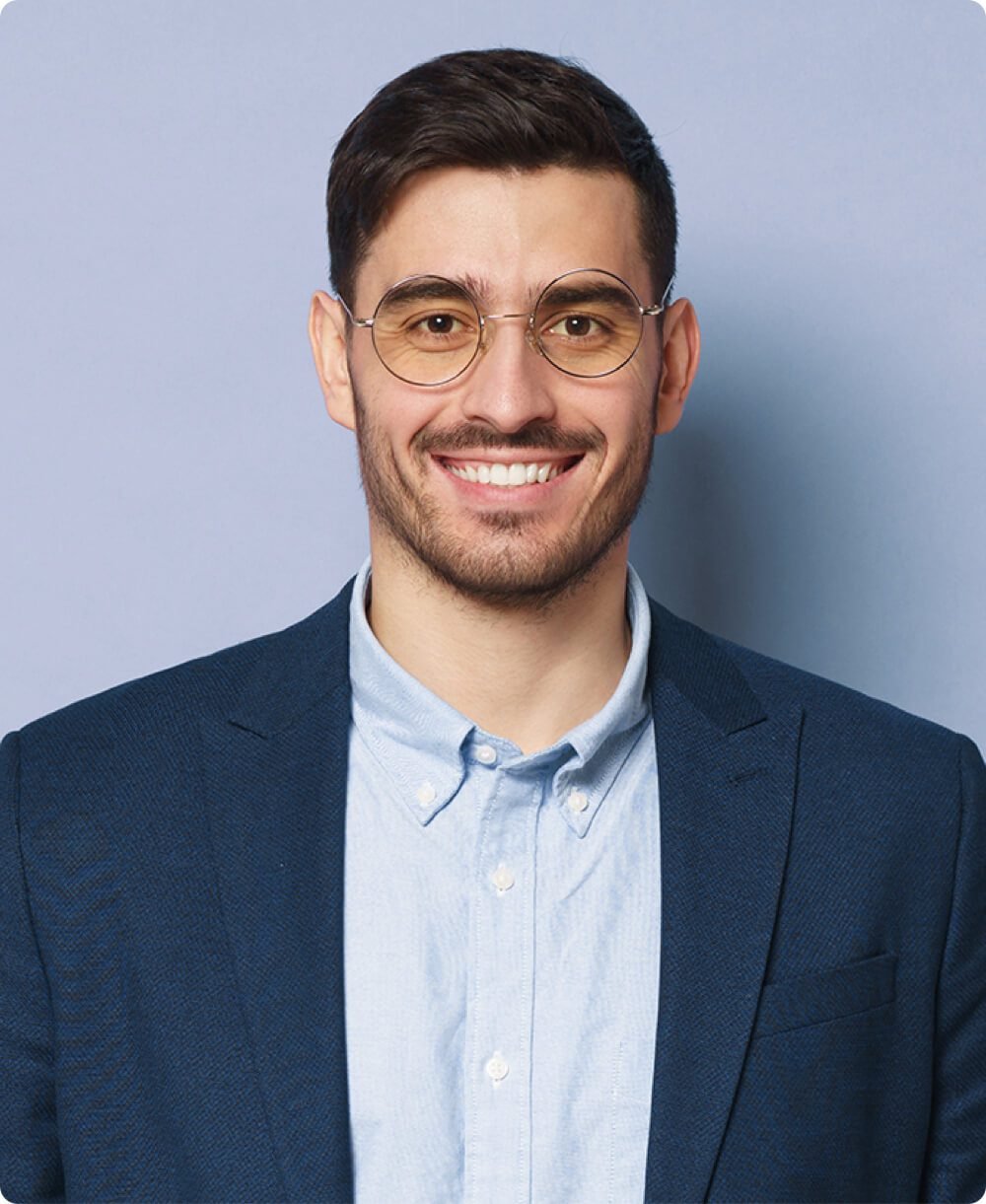 businessman-wearing-glasses-standing-in-confident-2023-11-27-05-14-24-utc.jpg